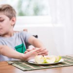47721328 – little kid refusing to eat healthy food